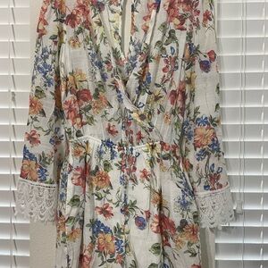 Charlotte Russe Floral Romper with Lace Trim